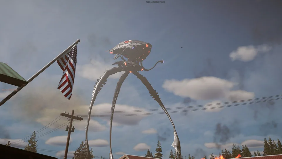 An enormous tripod rises above a small town and an American flag.