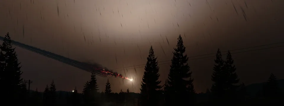 A bright falling object trails smoke and sparks through a rainy sky above dark evergreen trees.