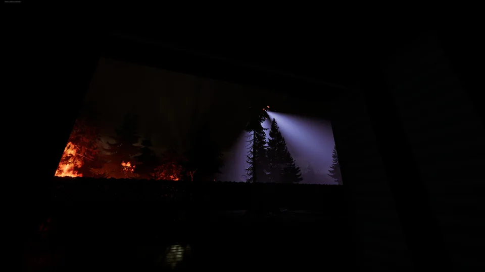 From a dark window, a tripod searchlight cuts through the pines beside a burning treeline.